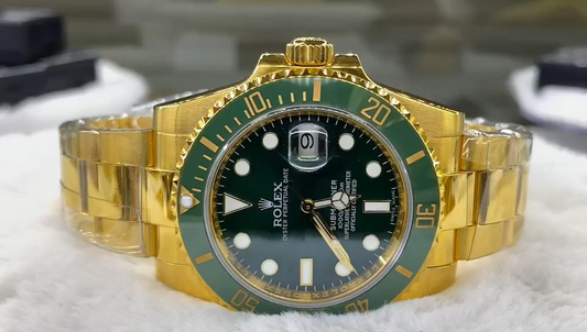 Rolex Gold Green Submariner